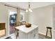 Breakfast nook with island and sliding door access to a wooden deck at 17401 Austrian Pine Way, Westfield, IN 46074