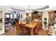 Spacious dining room with a large wooden table, chairs, and decorative hutch at 17401 Austrian Pine Way, Westfield, IN 46074