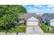 Attractive single-Gathering home with a two-car garage and nicely landscaped front yard at 17401 Austrian Pine Way, Westfield, IN 46074