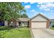 Charming home with brick accents, landscaped front yard, and a well-maintained lawn at 17401 Austrian Pine Way, Westfield, IN 46074