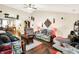 Comfortable living room with a ceiling fan and ample seating at 17401 Austrian Pine Way, Westfield, IN 46074