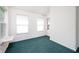 Bright, spacious bedroom with plush carpet, large windows, and a modern feel at 1856 Misty Lake Dr, Indianapolis, IN 46260