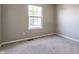 Bedroom featuring a neutral color palette, window, and cozy carpet at 19469 Amber Way, Noblesville, IN 46060