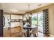 Bright kitchen featuring modern appliances, wooden floors, and a sliding door to the patio at 19469 Amber Way, Noblesville, IN 46060