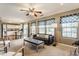 Comfortable living room with fireplace, ample seating, and access to the kitchen at 19469 Amber Way, Noblesville, IN 46060