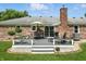 Back deck featuring outdoor dining and grilling area; perfect for entertaining at 1981 N Valley Ln, Greenfield, IN 46140