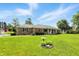 Charming brick home with well-kept lawn and manicured landscaping at 1981 N Valley Ln, Greenfield, IN 46140