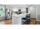 Bright kitchen with granite counters, white cabinets, and stainless steel appliances at 1981 N Valley Ln, Greenfield, IN 46140