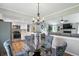 Open concept living spaces seamlessly connects the eat-in kitchen, dining area, and living room at 1981 N Valley Ln, Greenfield, IN 46140