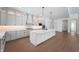 Spacious white kitchen with large island, pendant lighting, modern appliances, and ample cabinet space at 19832 Chatsworth Blvd, Westfield, IN 46074
