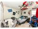 Bedroom with a grey sofa and gaming chair at 2029 Seven Peaks Dr, Cicero, IN 46034
