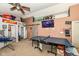Game room with TV, ping pong table, and decor at 2029 Seven Peaks Dr, Cicero, IN 46034