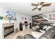 Inviting living room with fireplace, ceiling fan, and neutral decor at 2029 Seven Peaks Dr, Cicero, IN 46034