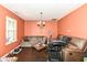 Comfortable living room with neutral-toned couches and hardwood floors at 2029 Seven Peaks Dr, Cicero, IN 46034