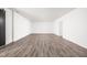 Unfinished basement with light wood flooring, white walls, and recessed lighting, ready to be finished at 20450 Chatham Hills Blvd, Westfield, IN 46074