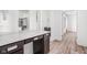 Bright bathroom featuring a vanity with a white countertop and modern fixtures, plus a walk-in closet at 20450 Chatham Hills Blvd, Westfield, IN 46074