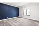 Spacious bedroom featuring a large window with natural light and plush carpet at 20450 Chatham Hills Blvd, Westfield, IN 46074