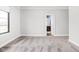 A large bedroom area featuring neutral walls and carpet plus a doorway to the bathroom at 20450 Chatham Hills Blvd, Westfield, IN 46074