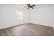 Bedroom featuring a fan, a window, and wood-look flooring at 20450 Chatham Hills Blvd, Westfield, IN 46074