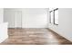 Bedroom featuring hardwood flooring, neutral walls and a door and window at 20450 Chatham Hills Blvd, Westfield, IN 46074