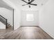 Bonus Room featuring a window, fan, and wood-look flooring at 20450 Chatham Hills Blvd, Westfield, IN 46074