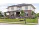 Beautiful two-story brick home with manicured lawn and landscaping at 20450 Chatham Hills Blvd, Westfield, IN 46074