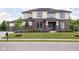 Beautiful two-story home with brick and siding exterior, manicured lawn, and inviting curb appeal at 20450 Chatham Hills Blvd, Westfield, IN 46074