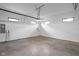 Spacious two car garage with concrete floor, electric car charger, and plenty of storage at 20450 Chatham Hills Blvd, Westfield, IN 46074