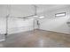 Two car garage with concrete floor and plenty of storage with an electric car charger at 20450 Chatham Hills Blvd, Westfield, IN 46074