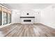 Bright living room with hardwood floors and a modern fireplace at 20450 Chatham Hills Blvd, Westfield, IN 46074