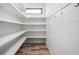 Pantry with a small window and custom shelving offering ample storage space at 20450 Chatham Hills Blvd, Westfield, IN 46074
