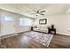 Cozy living room with modern decor, including a patterned rug and neutral-toned sofa at 2563 Harlan St, Indianapolis, IN 46203