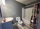 Standard bathroom with a shower and tub combination, as well as a single sink vanity at 3190 S Tacoma Ave, Indianapolis, IN 46237