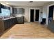 Traditional kitchen with ample cabinet space and laminate floors offers functionality and style at 3190 S Tacoma Ave, Indianapolis, IN 46237