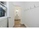 Bright bathroom with vanity and mirror, accessible from hall at 3709 Central Ave, Indianapolis, IN 46205