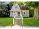 Charming front exterior of a well-maintained home with a landscaped lawn and inviting porch at 3709 Central Ave, Indianapolis, IN 46205
