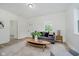 Open living room featuring views to other rooms, and neutral decor at 3709 Central Ave, Indianapolis, IN 46205