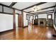 Spacious living room with hardwood floors, fireplace, and classic design at 39 N Bosart N Ave, Indianapolis, IN 46201
