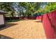 Large backyard with a wood privacy fence at 402 N Oxford St, Indianapolis, IN 46201