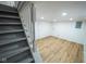 Finished basement area featuring modern flooring and recessed lighting at 402 N Oxford St, Indianapolis, IN 46201