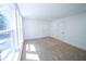 Spacious bedroom with large windows and neutral carpeting at 402 N Oxford St, Indianapolis, IN 46201