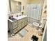 Bathroom with tiled floor, a vanity with good storage, and a shower-tub combination at 409 N Kyle St, Edinburgh, IN 46124