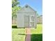 Backyard shed with double doors at 409 N Kyle St, Edinburgh, IN 46124