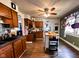 Well-equipped kitchen with stainless steel appliances, stylish backsplash, and wood cabinets at 430 W Locust St, Shelbyville, IN 46176