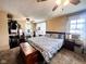 Cozy bedroom features closet space, a ceiling fan, and natural light at 430 W Locust St, Shelbyville, IN 46176