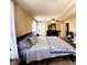 Bedroom with a ceiling fan, dresser, and natural light at 430 W Locust St, Shelbyville, IN 46176