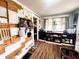 Mud room featuring wood paneling and storage solutions for convenience at 430 W Locust St, Shelbyville, IN 46176