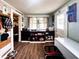 A practical mud room features built-in storage and hardwood floors at 430 W Locust St, Shelbyville, IN 46176