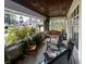 Inviting porch with a swing and view of the landscaped yard at 430 W Locust St, Shelbyville, IN 46176