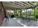 Lovely pergola-covered back deck perfect for outdoor entertaining and relaxation at 4704 Pearcrest Way, Greenwood, IN 46143